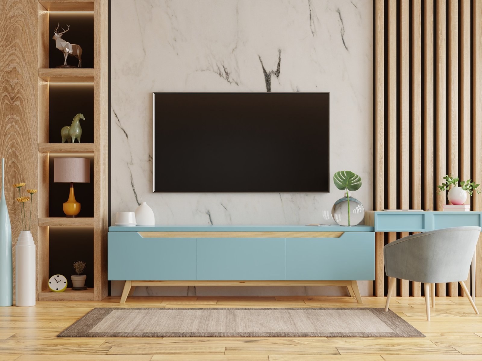 Home interior with armchair and tv cabinet on empty marble wall.